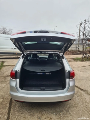Opel Astra Sport Tourer Turbo 1.4 ECOTEC Dynamic - imagine 6