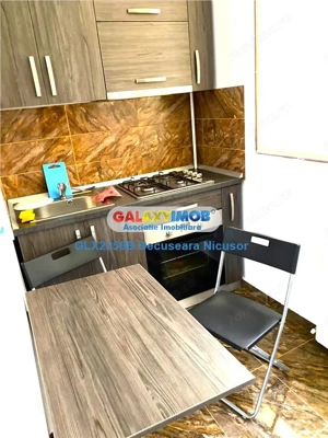 Garsoniera dubla Militari Residence mobilata utilata 330 euro - imagine 5