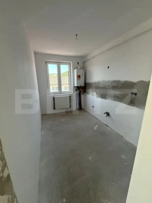 Apartament semifinisat, decomandat, terasa de 53 mp, zona Eroilor - imagine 2