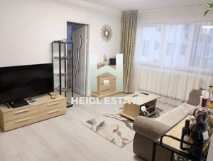 Apartament mobilat cu 2 camere in zona Dacia etaj intermediar