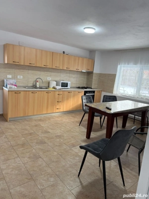 Inchiriez casa utilata si mobilata, util 215 mp, parter + etaj, 4 dormitoare, bucatarie, 3 bai - imagine 3
