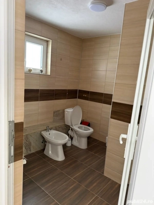 Inchiriez casa utilata si mobilata, util 215 mp, parter + etaj, 4 dormitoare, bucatarie, 3 bai - imagine 10