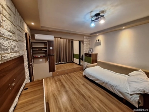 B-dul Bucuresti (zona Semiluna)   garsoniera, finisata, mobilata si utilata