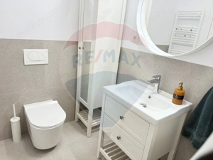 Apartament cu 2 camere de închiriat în Silk District - imagine 12