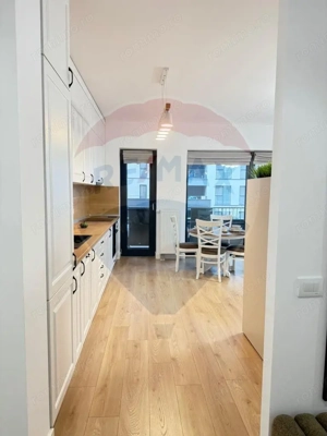 Apartament cu 2 camere de închiriat în Silk District - imagine 10