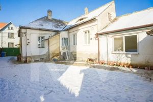 Casă individuală compusă din două apartamente, cu teren liber de 540 mp 