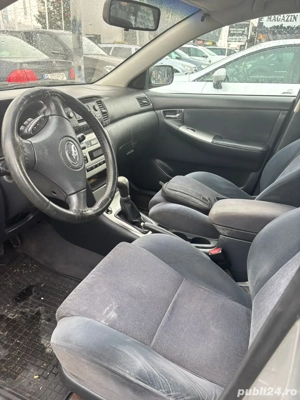 Toyota Corolla 2004 - imagine 10