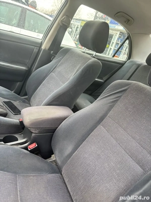 Toyota Corolla 2004 - imagine 3