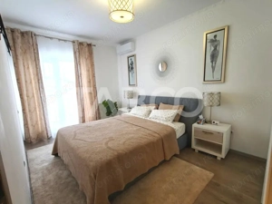 Penthouse cu 2 camere decomandate 2 terase si 2 locuri de parcare - imagine 4