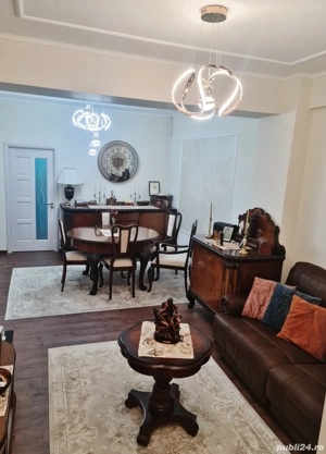 Central - Apartament lux, 64 mp utili + boxa 15 mp - imagine 2