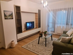 Închiriez apartament nou cu loc de parcare
