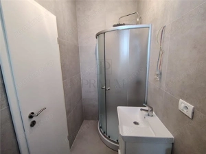 Duplex despartit prin camera tehnica - 2 dormitoare - 2 bai - zona foarte buna - imagine 12