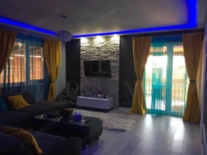 Casa individuala pe parter - mobilata - toate utilitatile - asfalt - teren 450 mp.