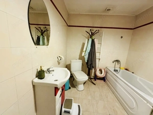 Apartament 3 camere in vila Giulesti zona linistita și curte generoasă etaj 1 - imagine 11