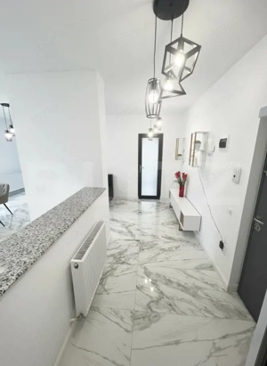 Apartament nou de 2 camere, complet mobilat si utilat modern, cu parcare - imagine 2