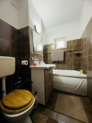 Apartament 4 camere, decomandat, etaj 2, 78mp in Bucovina - imagine 11