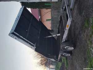 Remorca platforma basculabila