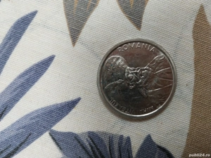 Vând moneda de 100 de lei