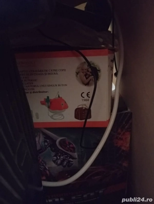 aerosol in forma de delfin