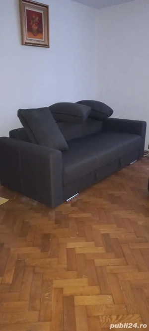 Canapea extensibila cu lada de depozitare