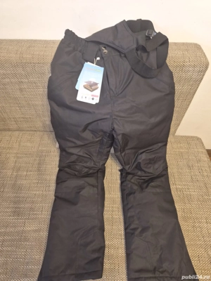 Vand 2 perechi pantaloni schi baiat 12-13 ani