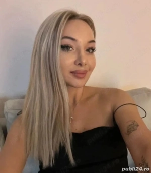 Bună mă numesc Adina 