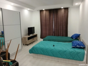 Inchiriez apartament doua dormitoare,living,baie,bucatarie Cosmopolis