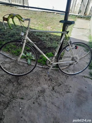 vând bicicletă semicursa marca victoria 