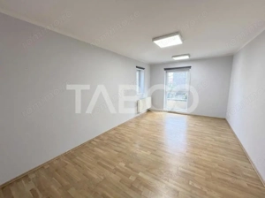 Cladire de birouri cu spatiu comercial la parter si 6 locuri parcare - imagine 3