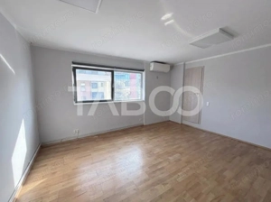 Cladire de birouri cu spatiu comercial la parter si 6 locuri parcare - imagine 2