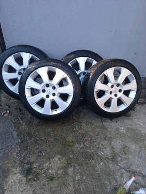 Schimb, -vind genti pe 17 cu cauciucuri stare foarte buna pt Opel 