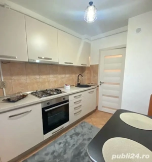 apartament decomandat cu 2 camere si centrala CHIRIE in Zona TRACTORUL
