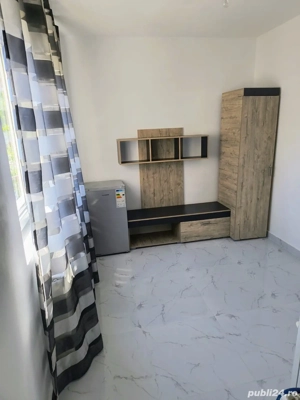 închiriez garsonira 