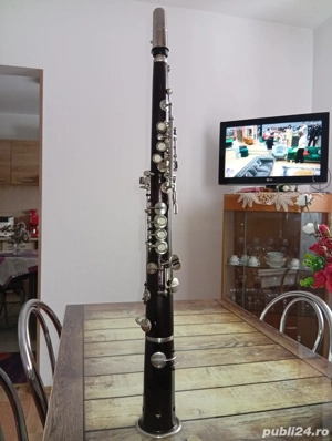 Taragot din abanos pe mâna stângă(dreapta sus)transformat din taragot pe stânga!