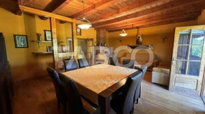 Casa de vanzare 6 camere loc de relaxare garaj teren 669 mp Cornatel - imagine 2