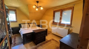 Casa de vanzare 6 camere loc de relaxare garaj teren 669 mp Cornatel - imagine 16