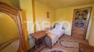 Casa de vanzare 6 camere loc de relaxare garaj teren 669 mp Cornatel - imagine 11