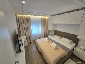 Regim Hotelier 2 camere Iulius Town - imagine 3