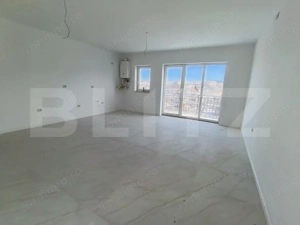 Apartament cu 3 camere in suprafata de 85 mp si teren de 100 mp