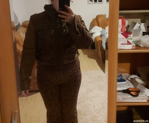 Vând aceasta haină