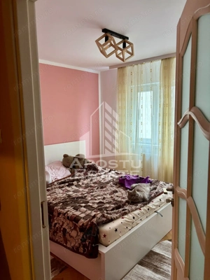 Apartament cu 3 camere, 2 balcoane, 2 bai,etaj intermediar,