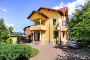 Casă de vânzare   110 mp, curte spațioasă și grădină verde - imagine 2