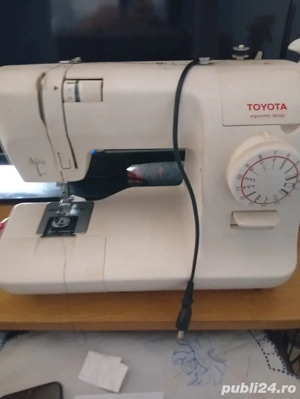 vind mașină de cusut marca Toyota 