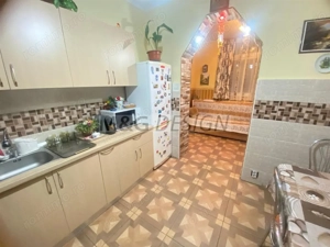 Casuta individuala p+m CENTRALA PROPRIE terasa curte comuna