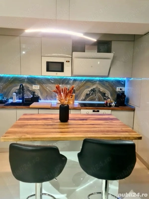 ÎNCHIRIERE  APARTAMENT  2 camere, nou, utilat și mobilat complet, cu garaj subteran, ZONA  CAROL - imagine 3