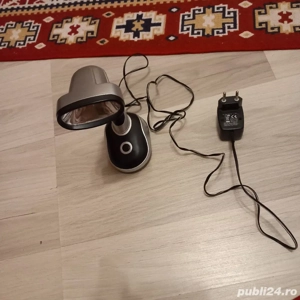 lanterna merge pe bateri si la priza 