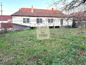 Casa 4 camere cu teren de 1020 mp in sat Hamba