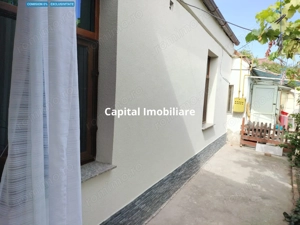 Casă Înșiruită pe Parter – Renovată Integral – Terasă + Curte