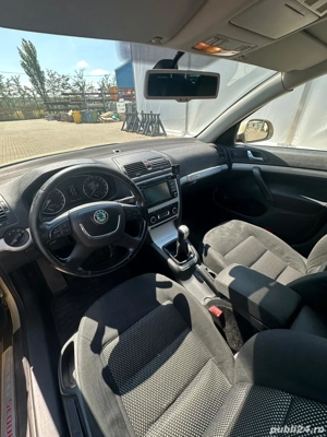 Skoda Octavia Combi 2.0 TDI DPF Scout 4x4 - imagine 2
