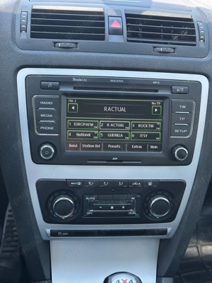 Skoda Octavia Combi 2.0 TDI DPF Scout 4x4 - imagine 4